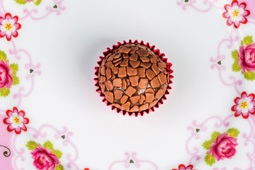 Traditional handmade Brazilian chocolate candy called brigadeiro. Top view