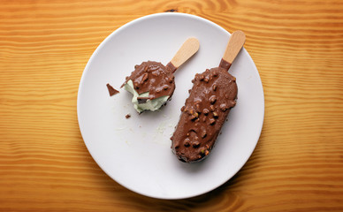 chocolate ice cream filled with pistachio cream - closeup