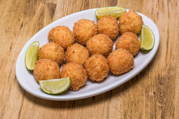 salt cod fritters, in portuguese it is called bolinho de bacalhau