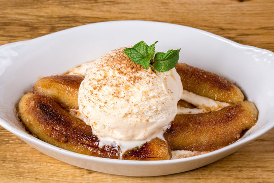 Banana Flambe With Vanilla Ice Cream. close up