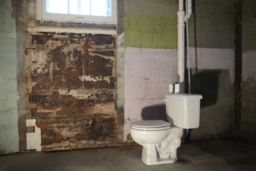 Bathroom that is rough and dirty, even scary.