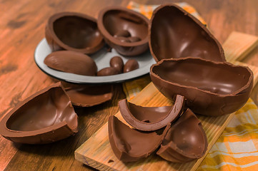 chocolate eggs on wooden background