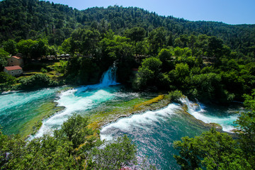 Waterfall in Krka National Park in Croatia - Flowing fresh water in the Dalmatian mountains
