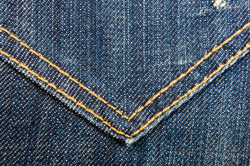clothing items blue stonewashed faded jeans cotton fabric texture with seams, clasps, buttons and...