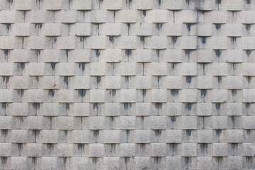 Gray construction bricks of an street 