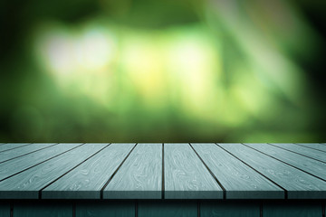 Fototapeta premium Product Display background with wooden table. Green blur effect illustration.