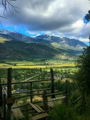 Fototapeta na wymiar mountain landscape with wooden fence