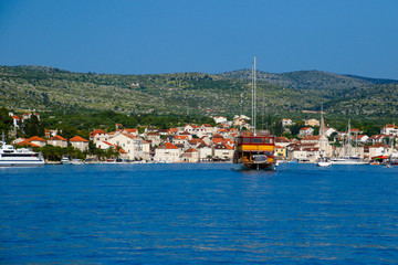 Fototapeta na wymiar Town of Milna waterfront and marina view from the sea, Island of Brac, Dalmatia, Croatia
