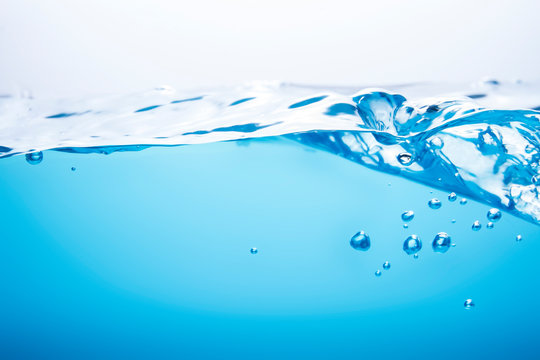 Beautiful water waves Splashed water wave in clean blue water
