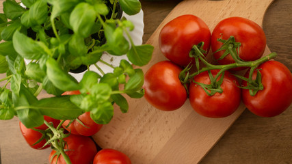 
Vegetables. Tomatoes and cucumbers with basil. Ready free entry space