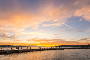 Fototapeta na wymiar scene of walk way on the lake when sunset.