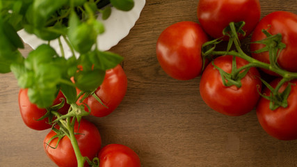 
Vegetables. Tomatoes and cucumbers with basil. Ready free entry space