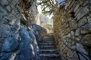 Steps leading up to the Starigrad fortress above the old town of Omis in Croatia - Medieval stronghold by the Adriatic Sea