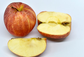 Naklejka na ściany i meble Fresh, ripe, orange apple, sliced, isolated on a white background