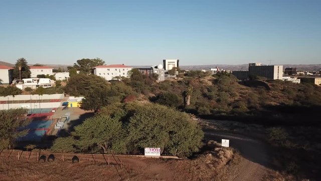 4K aerial drone video Windhoek meteorological service viewpoint, Windhoek high school sport grounds in city center in Namibia's capital in Namibia