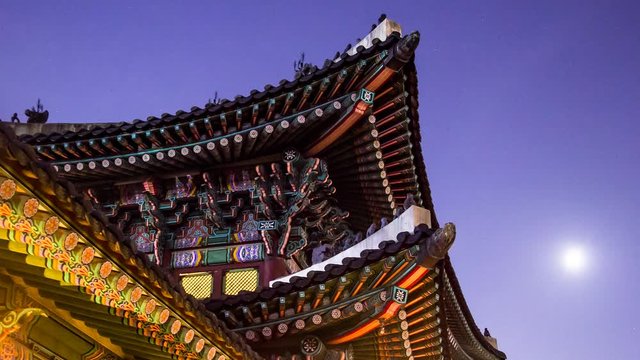 timelapse of night view with building and roof in gyeongbokgung palace (royal palace) 