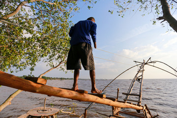 man walking on the river