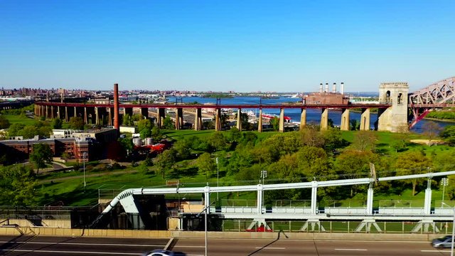 Aerial Pan Shot of the RFK and the Hell Gate Bridge Over the East River
