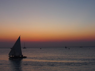 Fototapeta na wymiar Beautiful sunsets and ships, Nungwi, Zanzibar, Tanzania