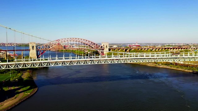 Aerial Pan Shot of the RFK and the Hell Gate Bridge Over the East River