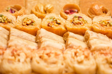 Sweet food industry. Tasty sweet baklava. Turkish Ramadan Dessert Baklava Presented. Sweet food background. Catering witn sweet table. Sweet food industry. Tasty baklava. Sweet background