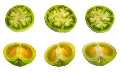 Set of a green sliced tomato isolated on white background