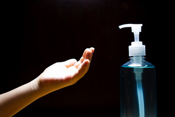 Hand of girl  that applying alcohol gel or anti bacteria soap to make cleaning and clear germ, bacteria,
