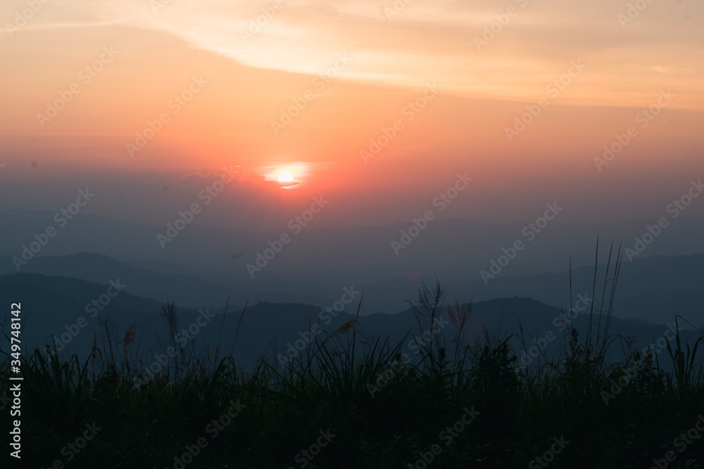 Canvas Prints sunset in the evening with alternating mountains