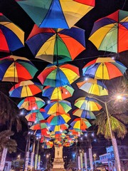 Fototapeta na wymiar colorful umbrellas on the park