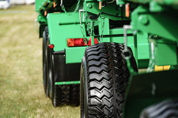Wheel and tyre at agricultural machine.