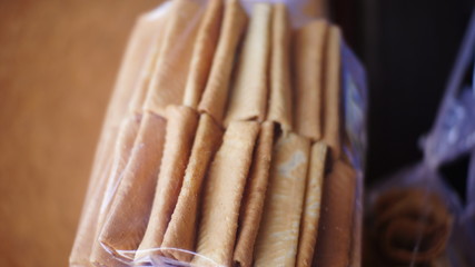 pastries wrapped in plastic in a cake shop