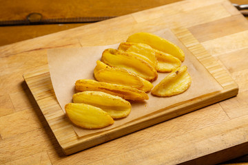 French fries, fried potatoes, snack on the table, fast food
