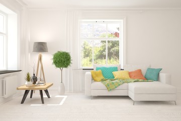 White living room with sofa and summer landscape in window. Scandinavian interior design. 3D illustration