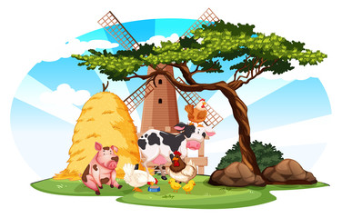 Farm scene with farm animals and windmill on the farm