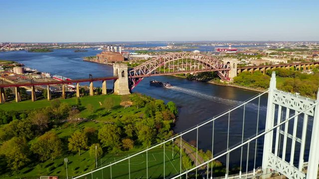 Aerial Crane Shot of the RFK and the Hell Gate Bridge Over the East River