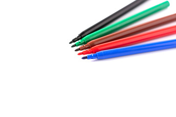 colored markers on a white background