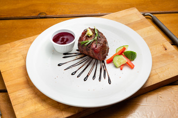 Roast beef, fried meat, meat dish with vegetables for lunch in a restaurant
