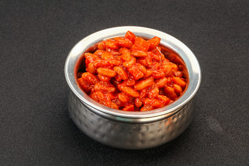 Fototapeta na wymiar Baked kidney with tomato and pepper
