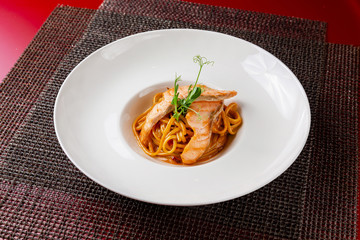 Italian pasta, noodles, preparing a dish in a cabin in a restaurant