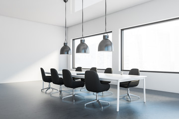 Fototapeta na wymiar White meeting room corner with black chairs