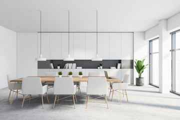 White and gray kitchen interior with table