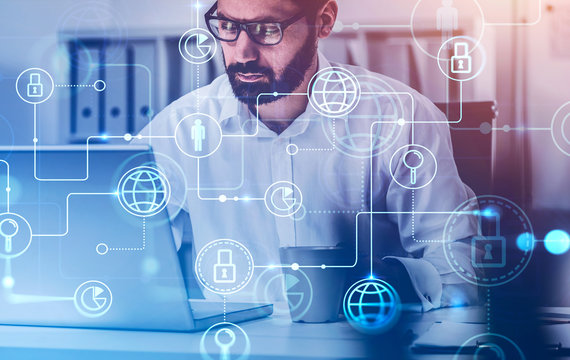 Bearded man with laptop, online business interface