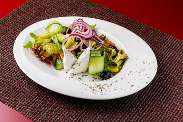 Vegetable and meat salad, classic salad for lunch in a restaurant