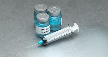 Vaccine bottle with syringe  steel background