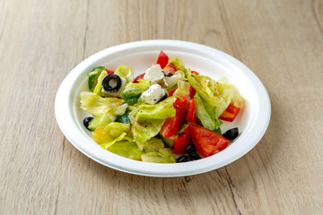 Vegetable and meat salad, classic salad for lunch in a restaurant