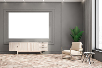 Grey living room with cabinet and poster