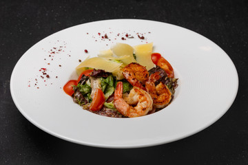 Vegetable and meat salad, classic salad for lunch in a restaurant