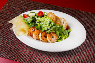 Vegetable and meat salad, classic salad for lunch in a restaurant
