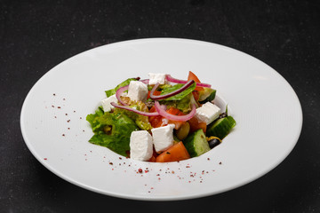 Vegetable and meat salad, classic salad for lunch in a restaurant