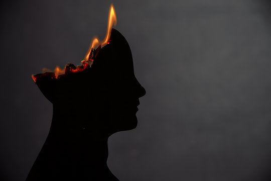 Brain disorder symbol presented by human head made form paper . Creative idea for Alzheimer's disease, dementia, memory loss and mental health concept